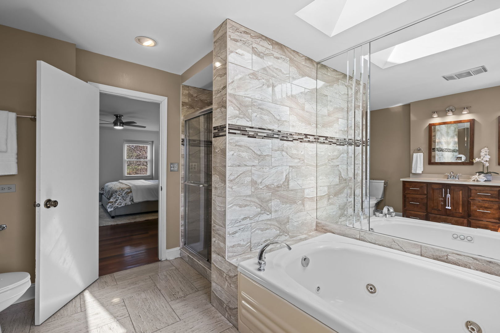 26 Brandywine Road South Barrington, IL 60010 - Photo 18 of 47 a bathroom with a tub shower and sink