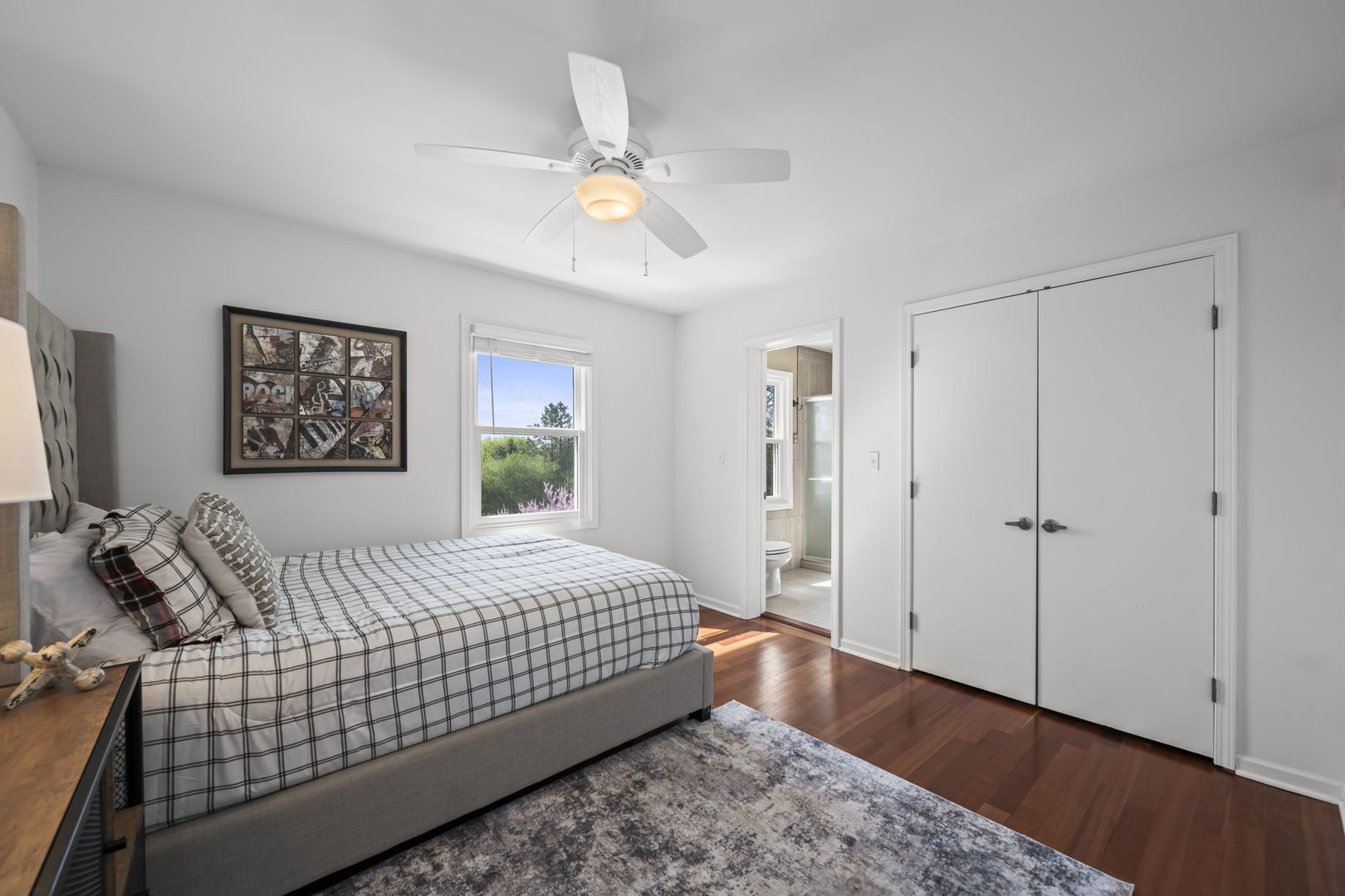 26 Brandywine Road South Barrington, IL 60010 - Photo 20 of 47 a bedroom with a large bed and a chandelier