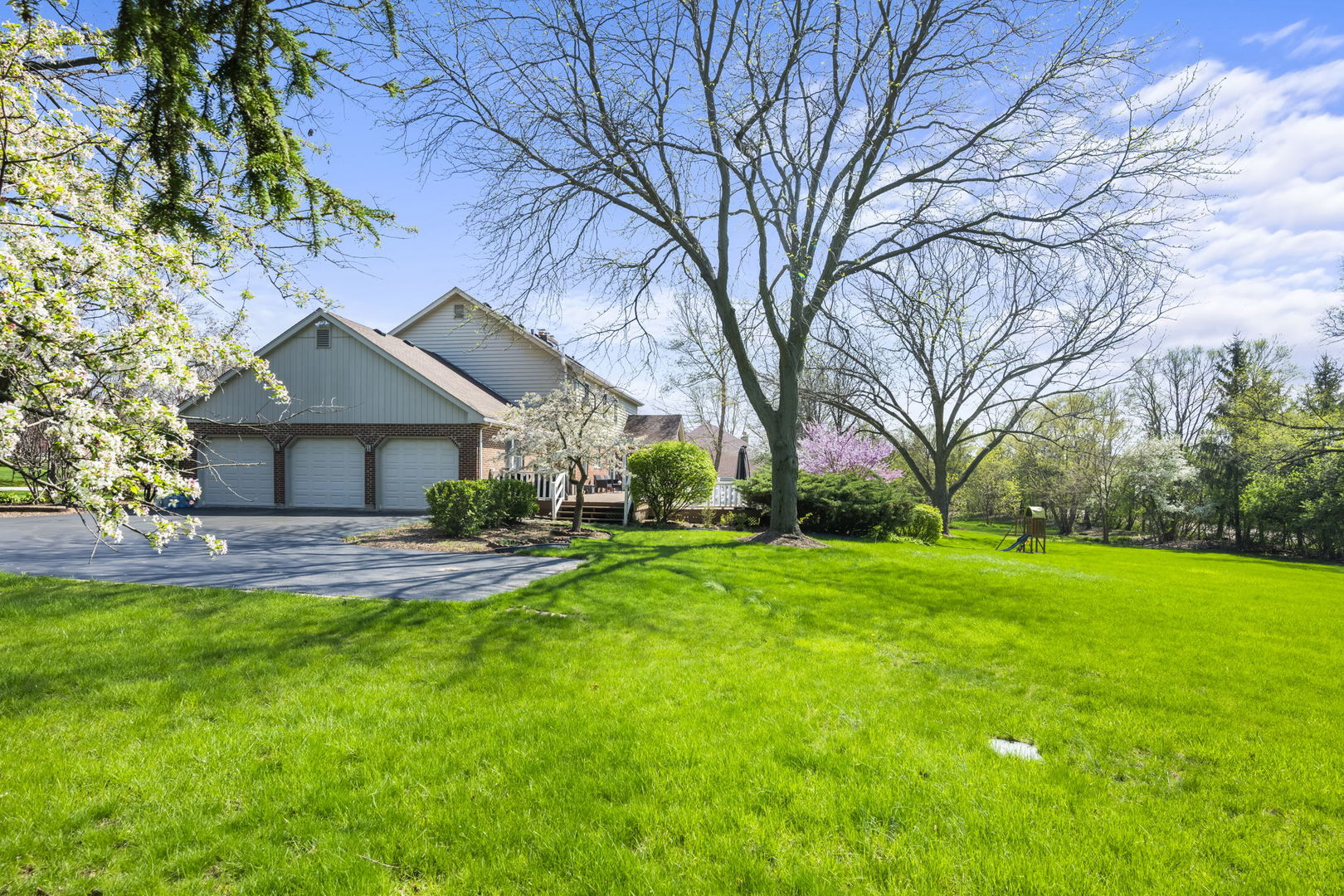 26 Brandywine Road South Barrington, IL 60010 - Photo 41 of 47 a front view of a house with a garden and trees