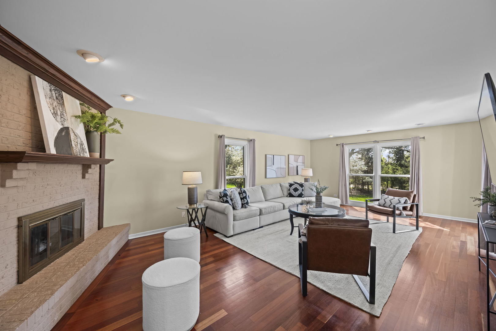 26 Brandywine Road South Barrington, IL 60010 - Photo 6 of 47 a living room with fireplace furniture and a wooden floor