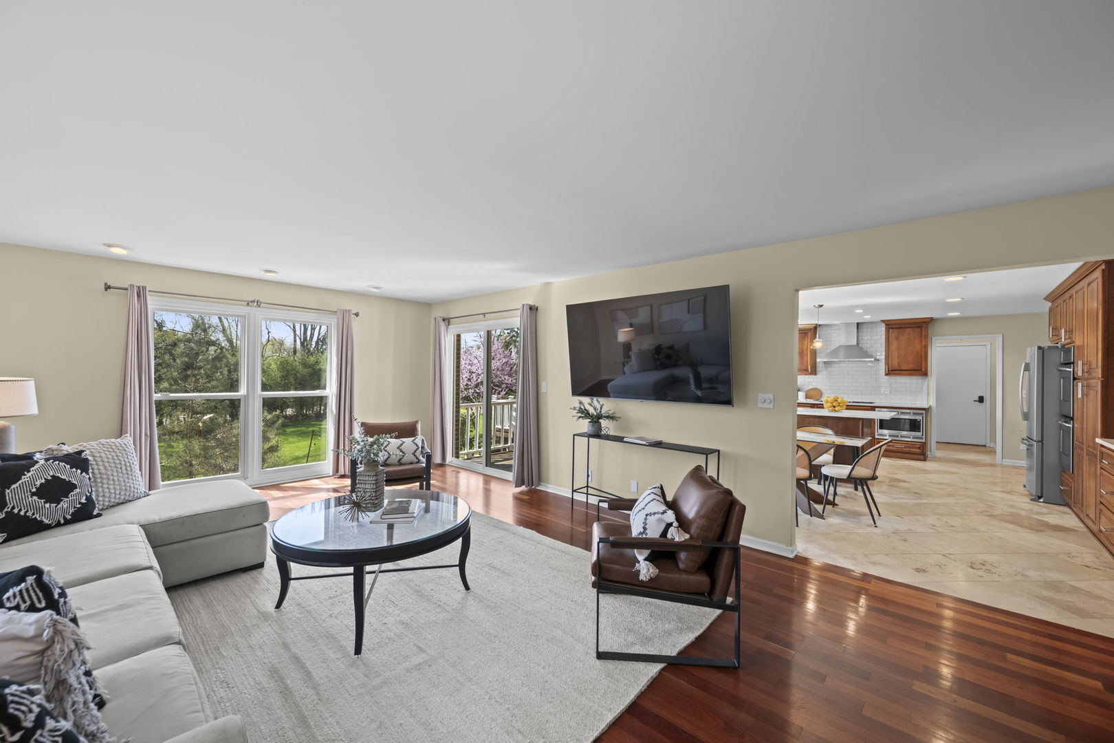 26 Brandywine Road South Barrington, IL 60010 - Photo 10 of 47 a living room with furniture flat screen tv and a large window