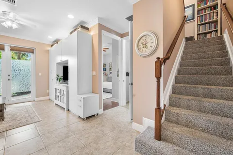 a view of a hallway with staircase