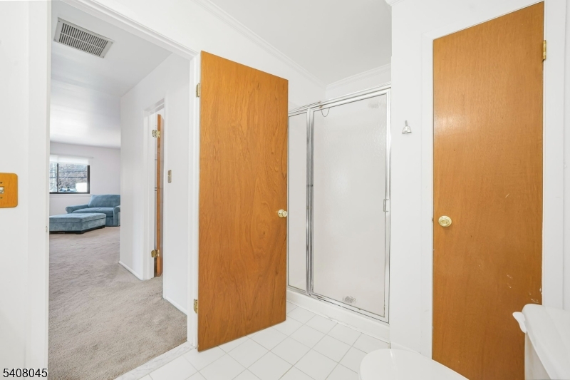 175 Castle Ridge Drive East Hanover, NJ 07936 - Photo 23 of 34 a view of a hallway with bathroom and bathroom