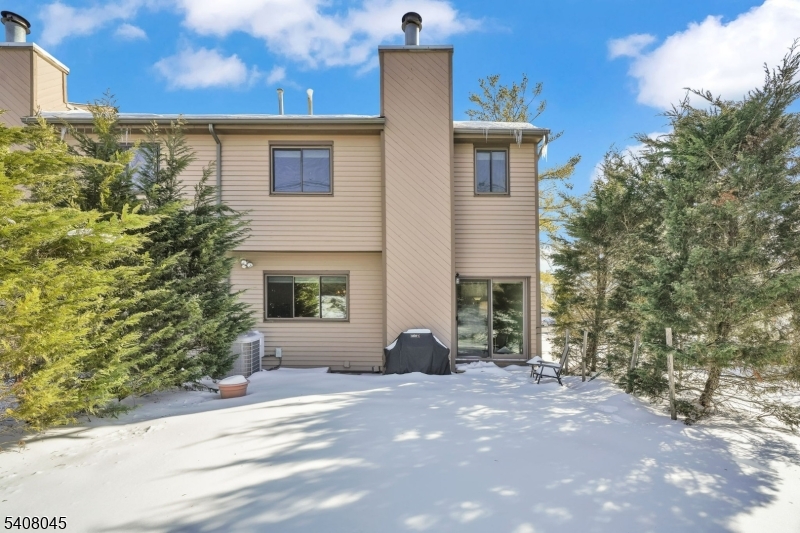 175 Castle Ridge Drive East Hanover, NJ 07936 - Photo 30 of 34 a view of a house with a yard