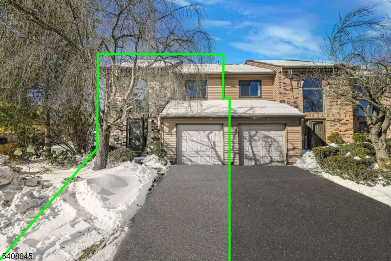 175 Castle Ridge Drive East Hanover, NJ 07936 - Photo 3 of 34 a front view of a house with a garden and patio