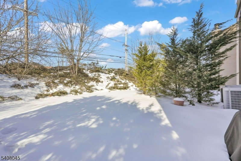 175 Castle Ridge Drive East Hanover, NJ 07936 - Photo 31 of 34 a view of a yard with a tree