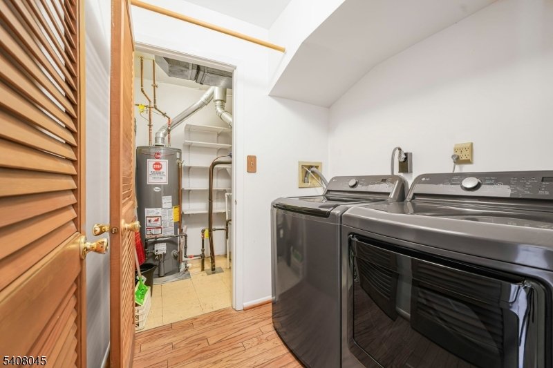 175 Castle Ridge Drive East Hanover, NJ 07936 - Photo 6 of 34 a view of dining room and wooden floor