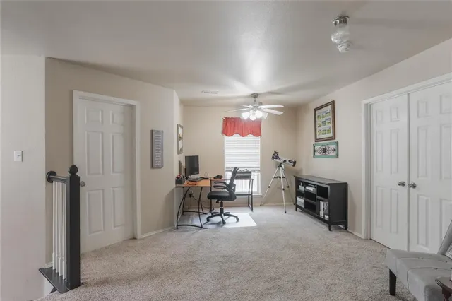 a view of livingroom with furniture and windows