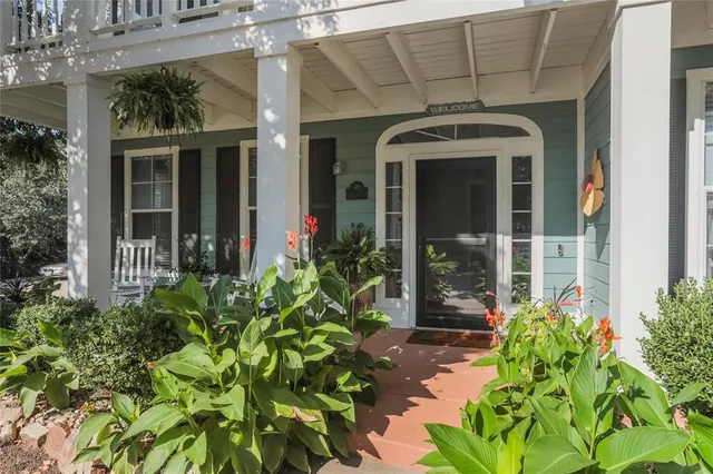 front view of a house with a large window