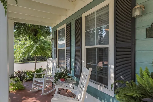a house view with a seating space and garden view