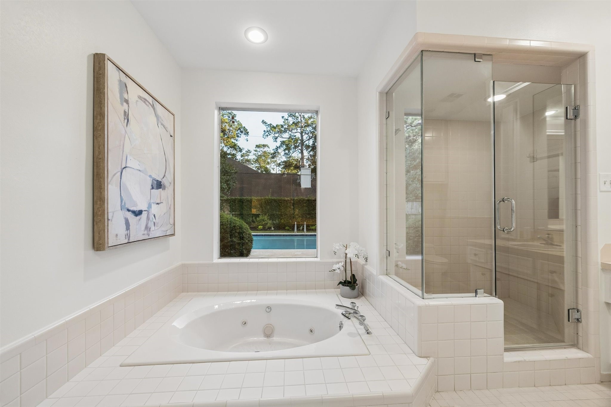 11903 Stoney Ridge Lane Houston, TX 77024 - Photo 25 of 44 Large primary bath with views of the pool