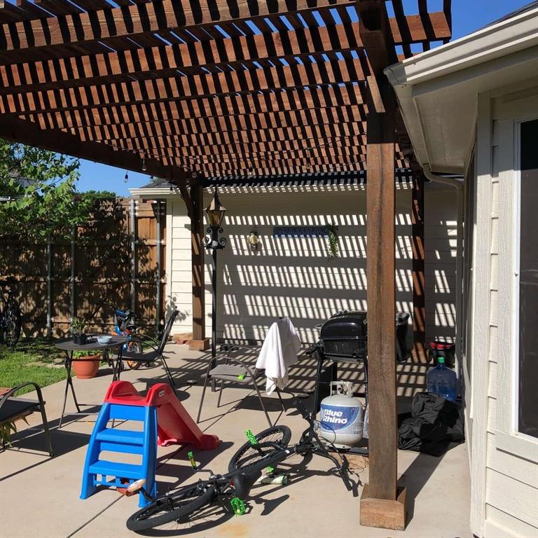 1202 Defford Lane Allen, TX 75002 - Photo 6 of 10 View of patio with a pergola
