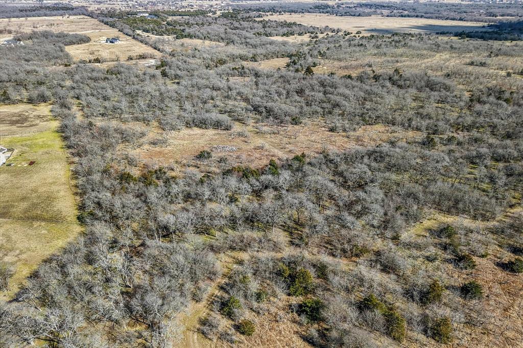 1100 Highpoint Road Royse City, TX 75189 - Photo 6 of 22 a view of a dry yard with green space