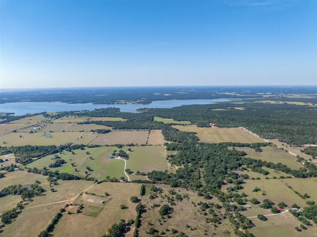 a view of a lake with a city