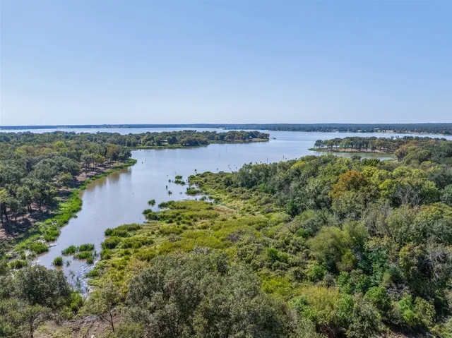 a view of a lake with a city