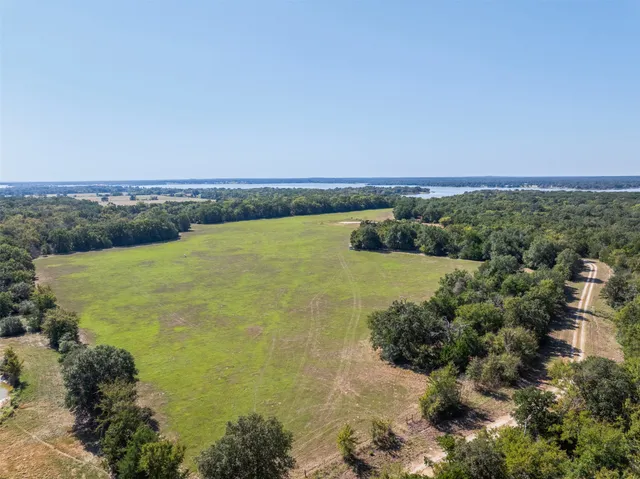 a view of a road with an ocean view