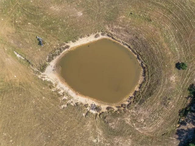 a view of a swimming pool and outdoor space