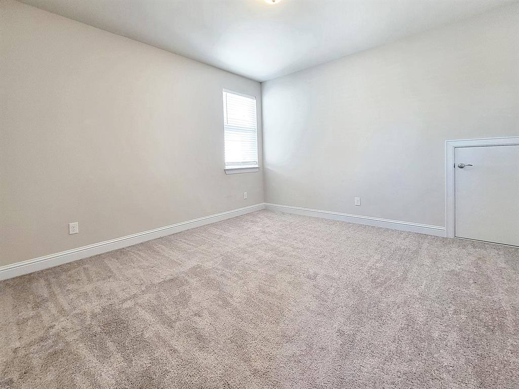 601 C-Bar Ranch Trail, Unit 14 Cedar Park, TX 78613 - Photo 11 of 22 an empty room with windows