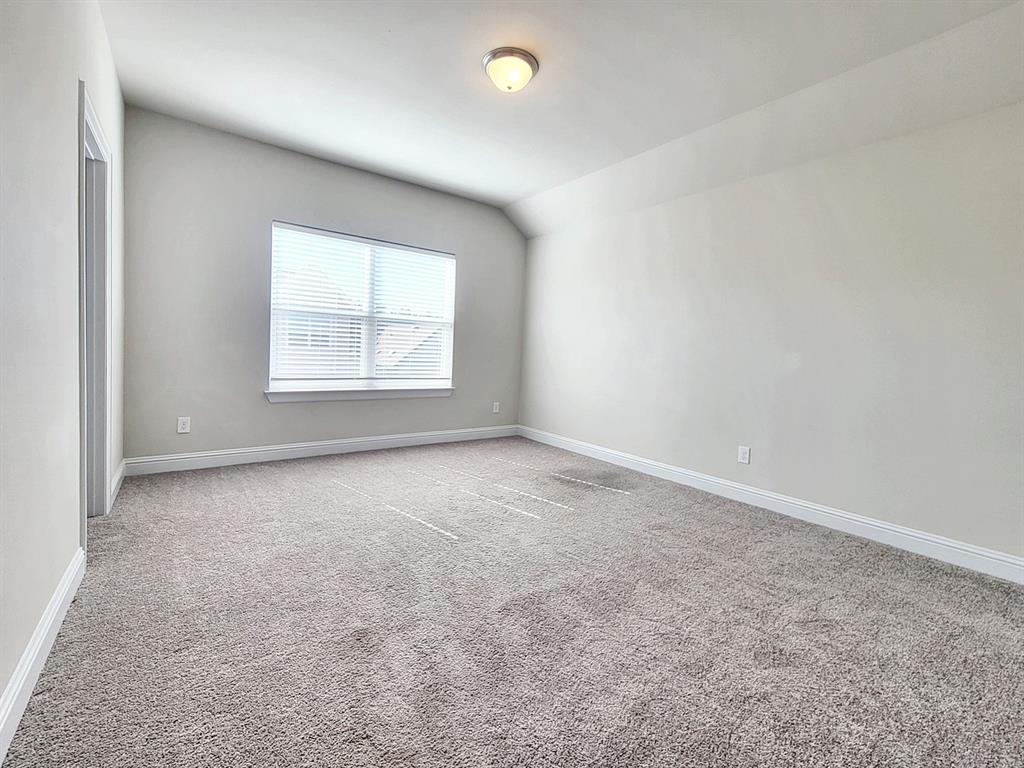 601 C-Bar Ranch Trail, Unit 14 Cedar Park, TX 78613 - Photo 13 of 22 an empty room with a empty space and windows