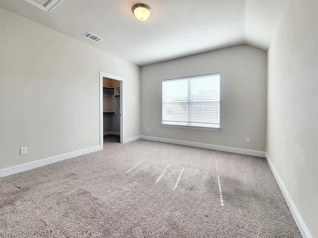 601 C-Bar Ranch Trail, Unit 14 Cedar Park, TX 78613 - Photo 16 of 22 an empty room with windows