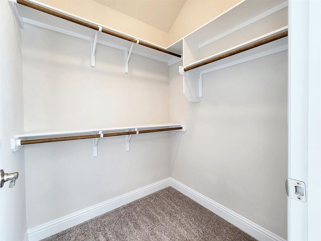 601 C-Bar Ranch Trail, Unit 14 Cedar Park, TX 78613 - Photo 17 of 22 a view of an empty walk in closet