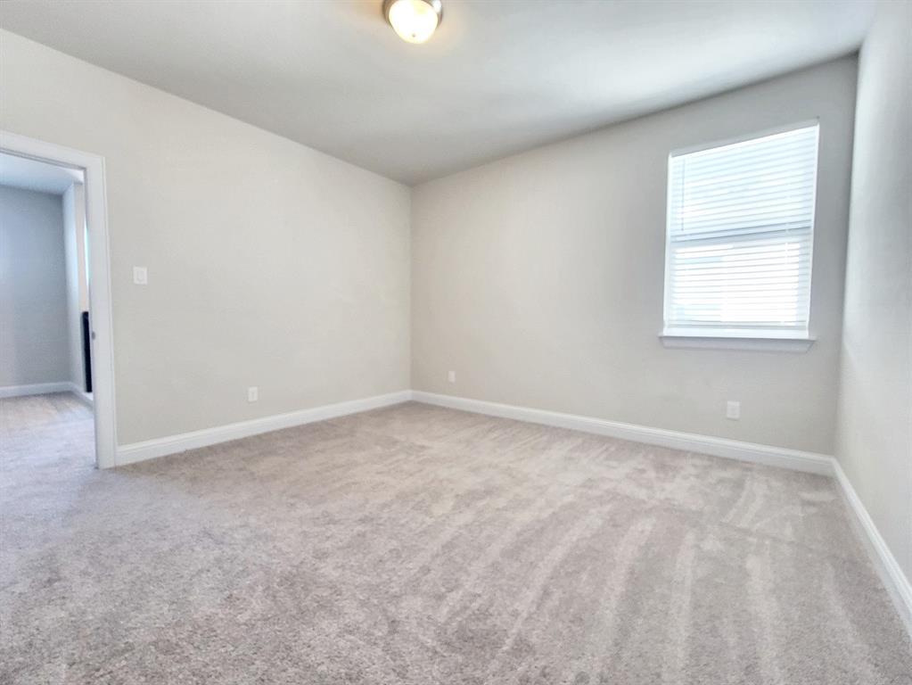 601 C-Bar Ranch Trail, Unit 14 Cedar Park, TX 78613 - Photo 18 of 22 an empty room with a window