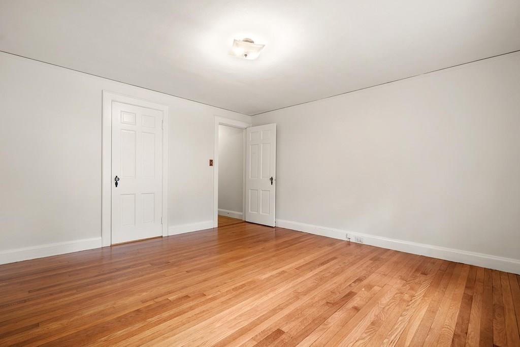 30 Pine Plain Road Wellesley, MA 02481 - Photo 18 of 27 a view of an empty room with wooden floor