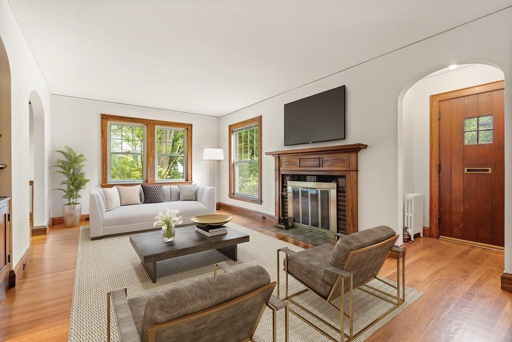 30 Pine Plain Road Wellesley, MA 02481 - Photo 2 of 27 a living room with furniture and a fireplace
