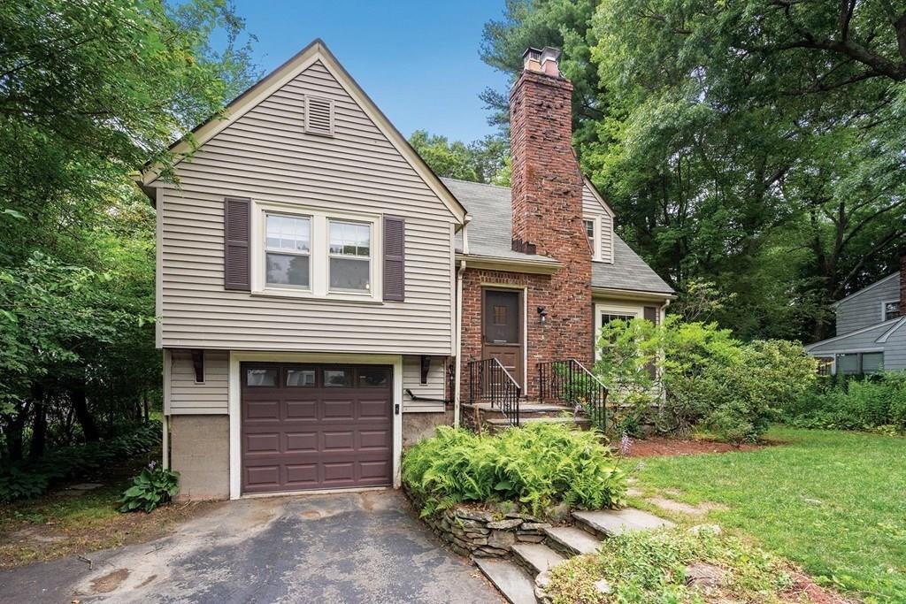 30 Pine Plain Road Wellesley, MA 02481 - Photo 27 of 27 a front view of a house with a garden