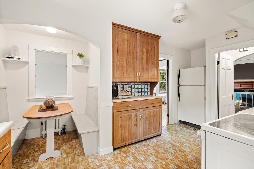 30 Pine Plain Road Wellesley, MA 02481 - Photo 4 of 27 a kitchen with stainless steel appliances granite countertop a refrigerator and a stove top oven