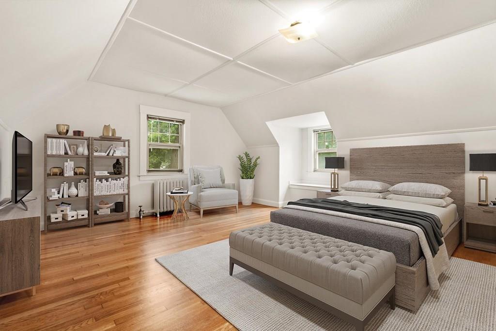 30 Pine Plain Road Wellesley, MA 02481 - Photo 6 of 27 a bedroom with a large bed and a couch