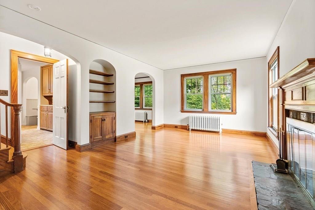 30 Pine Plain Road Wellesley, MA 02481 - Photo 7 of 27 a view of an empty room with window and wooden floor