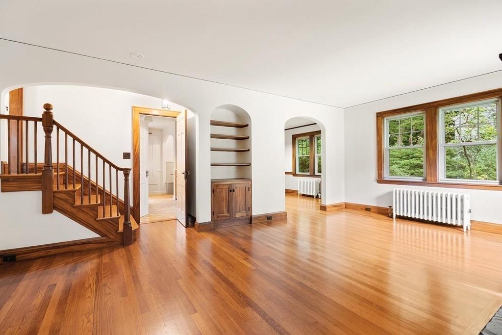 30 Pine Plain Road Wellesley, MA 02481 - Photo 8 of 27 a view of an empty room with wooden floor and a window