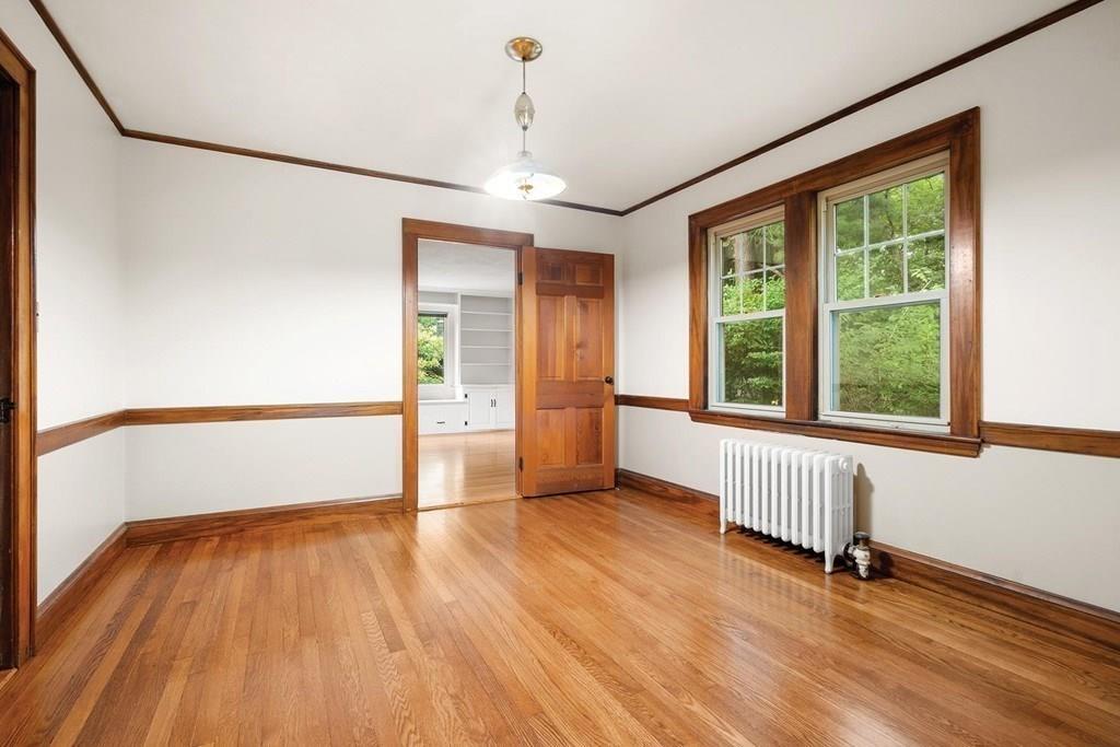 30 Pine Plain Road Wellesley, MA 02481 - Photo 10 of 27 a view of an empty room with wooden floor and a window