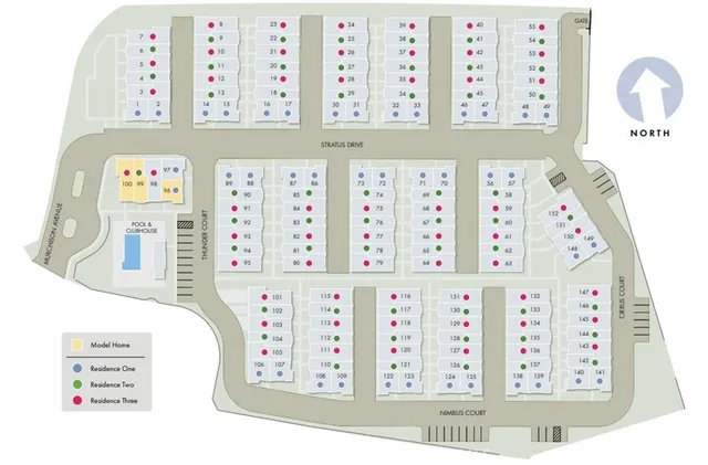 a red car parked in front of a building