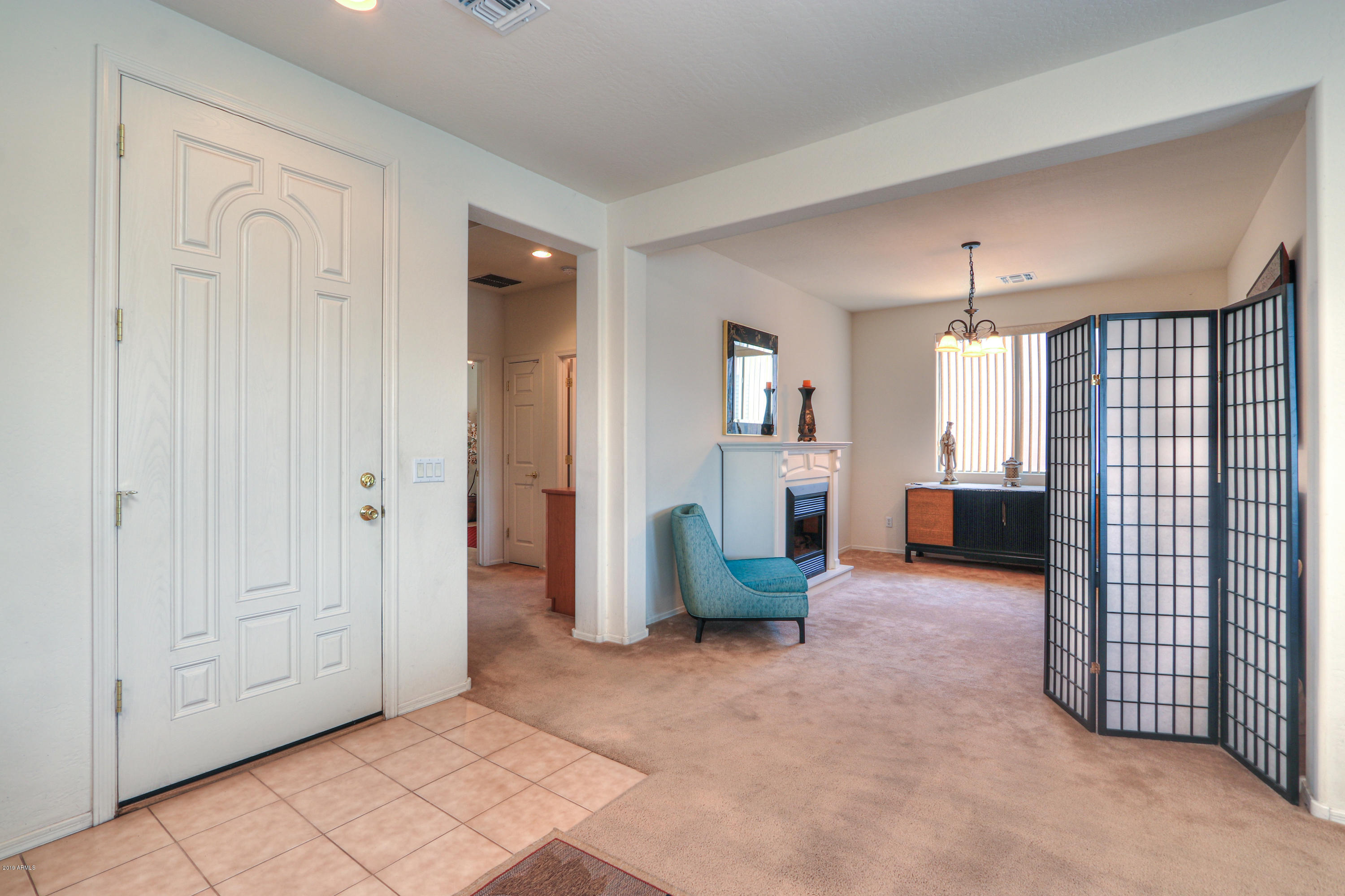 42485 Abbey Road Maricopa, AZ 85138 - Photo 23 of 74 a view of a livingroom with wooden floor