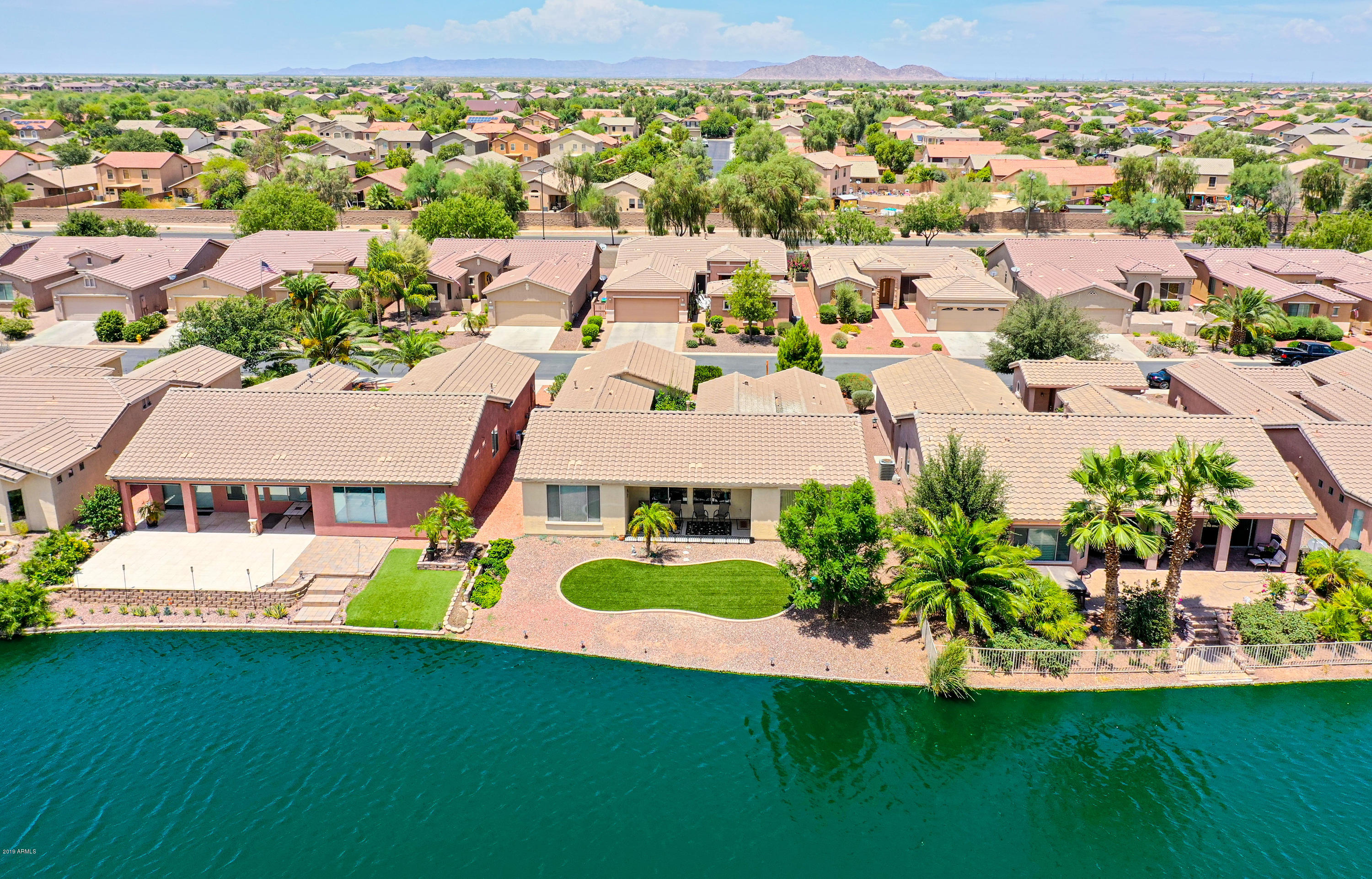 42485 Abbey Road Maricopa, AZ 85138 - Photo 3 of 74 an aerial view of residential houses with outdoor space and swimming pool