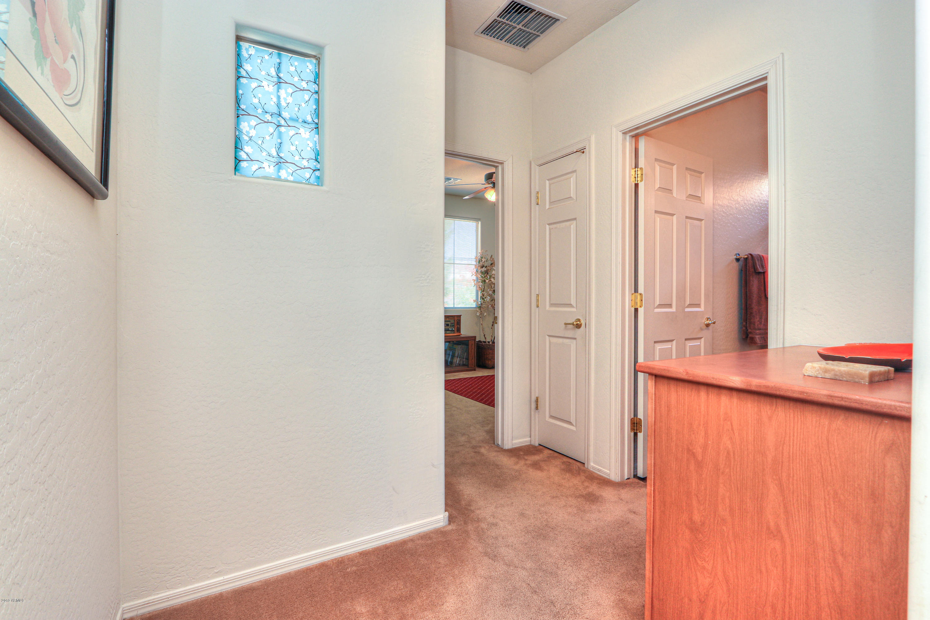 42485 Abbey Road Maricopa, AZ 85138 - Photo 40 of 74 an entryway with a workspace