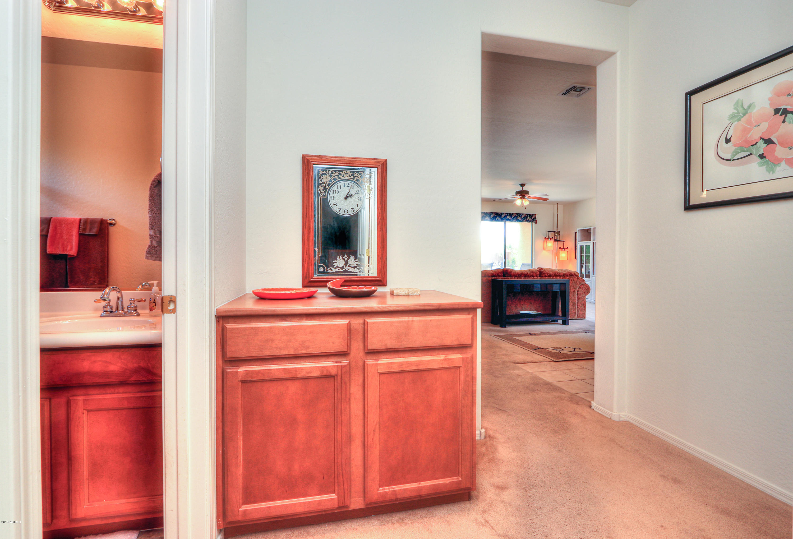 42485 Abbey Road Maricopa, AZ 85138 - Photo 43 of 74 a hall with kitchen island