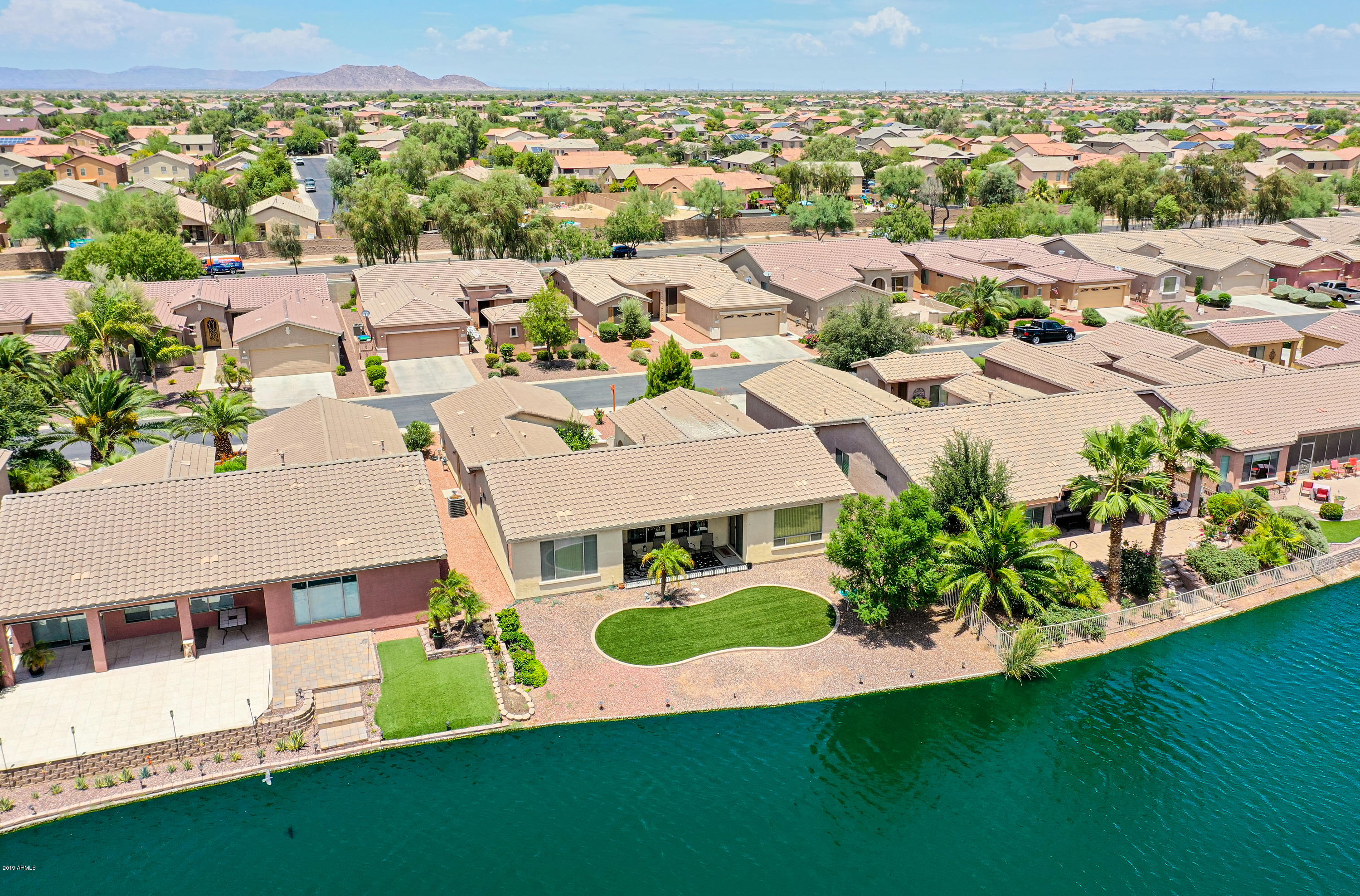 42485 Abbey Road Maricopa, AZ 85138 - Photo 59 of 74 an aerial view of residential house with outdoor space and swimming pool