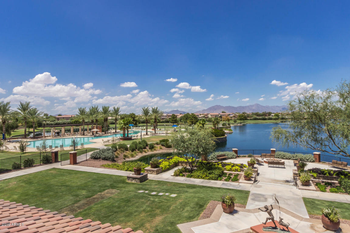42485 Abbey Road Maricopa, AZ 85138 - Photo 66 of 74 a view of a lake with a city
