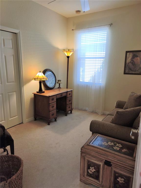 11997 Tempest Harbor Loop Venice, FL 34292 - Photo 28 of 52 a living room with furniture a couch and a window
