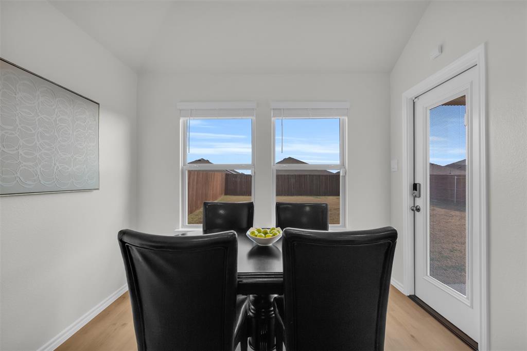 6513 Waterfall Lane Princeton, TX 75407 - Photo 11 of 35 a dining room with furniture and window