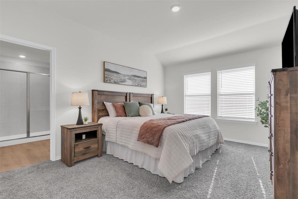 6513 Waterfall Lane Princeton, TX 75407 - Photo 13 of 35 a bedroom with a bed and a window