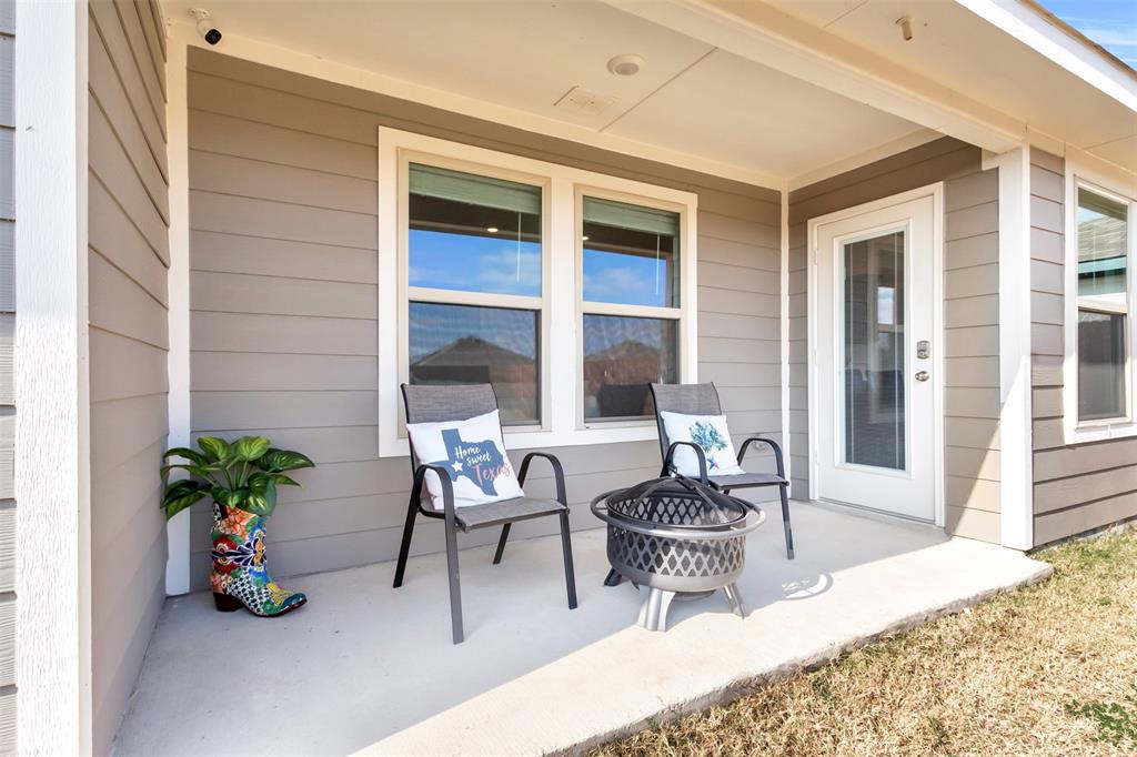6513 Waterfall Lane Princeton, TX 75407 - Photo 22 of 35 a outdoor living space with furniture and a potted plant