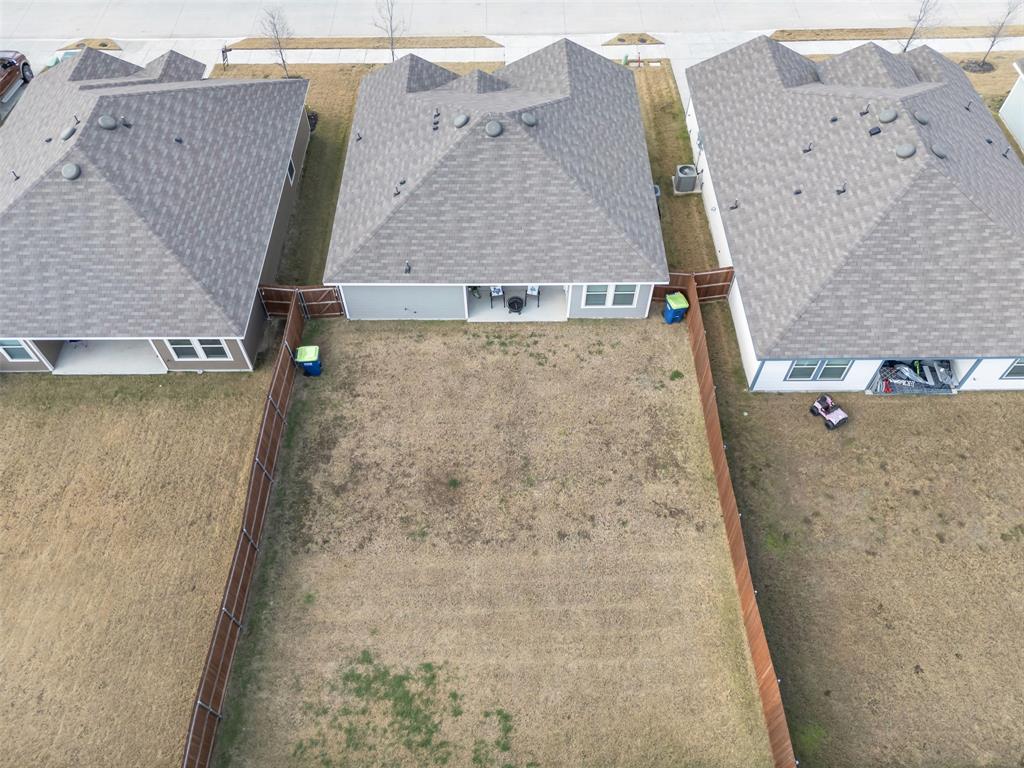 6513 Waterfall Lane Princeton, TX 75407 - Photo 26 of 35 an aerial view of a house