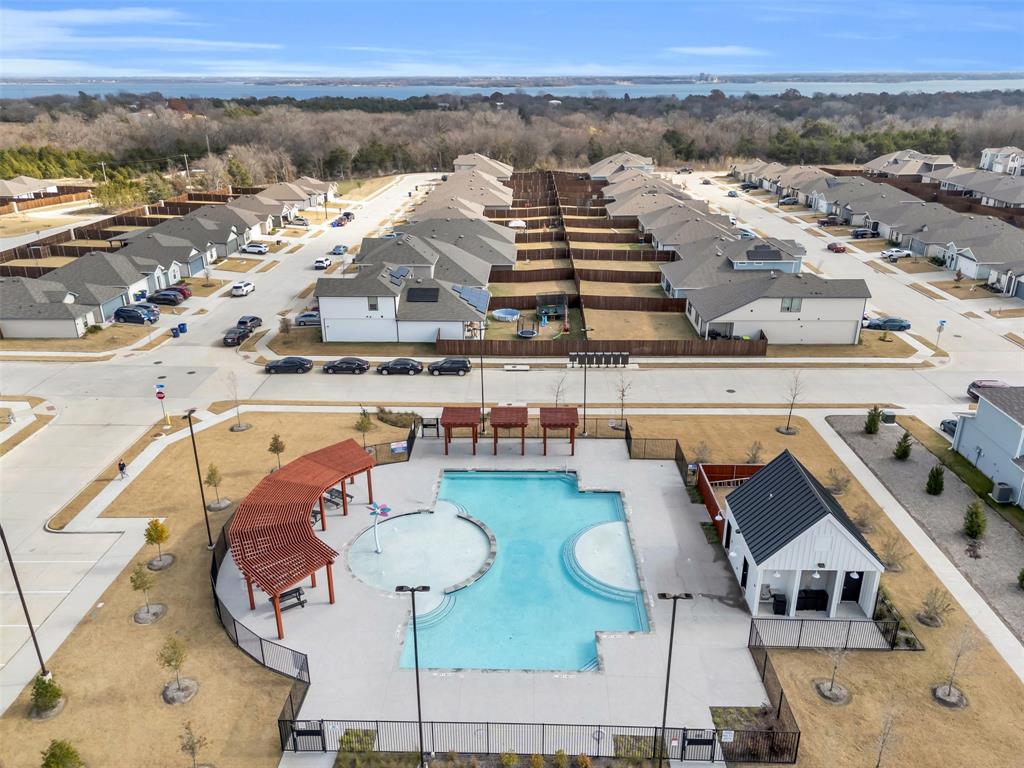 6513 Waterfall Lane Princeton, TX 75407 - Photo 32 of 35 an aerial view of a house with swimming pool