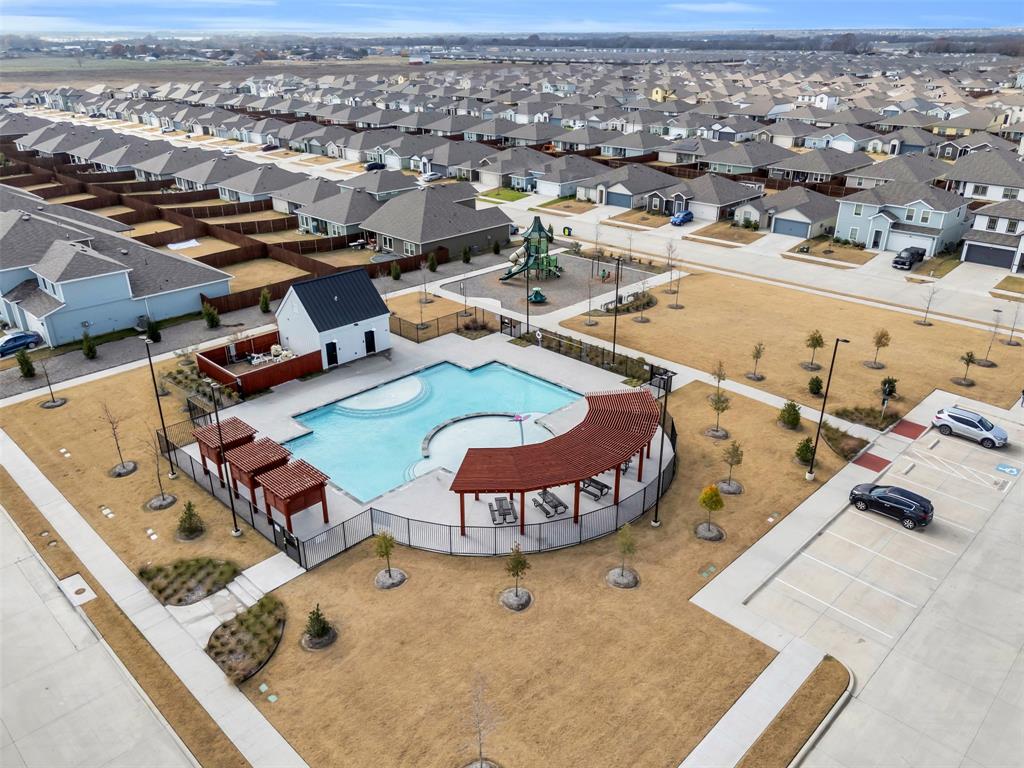 6513 Waterfall Lane Princeton, TX 75407 - Photo 33 of 35 an aerial view of a swimming pool