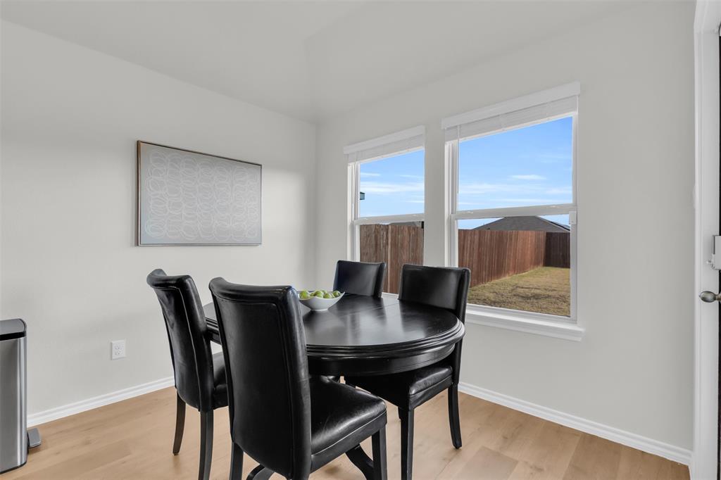 6513 Waterfall Lane Princeton, TX 75407 - Photo 10 of 35 a view of a dining room with furniture and window