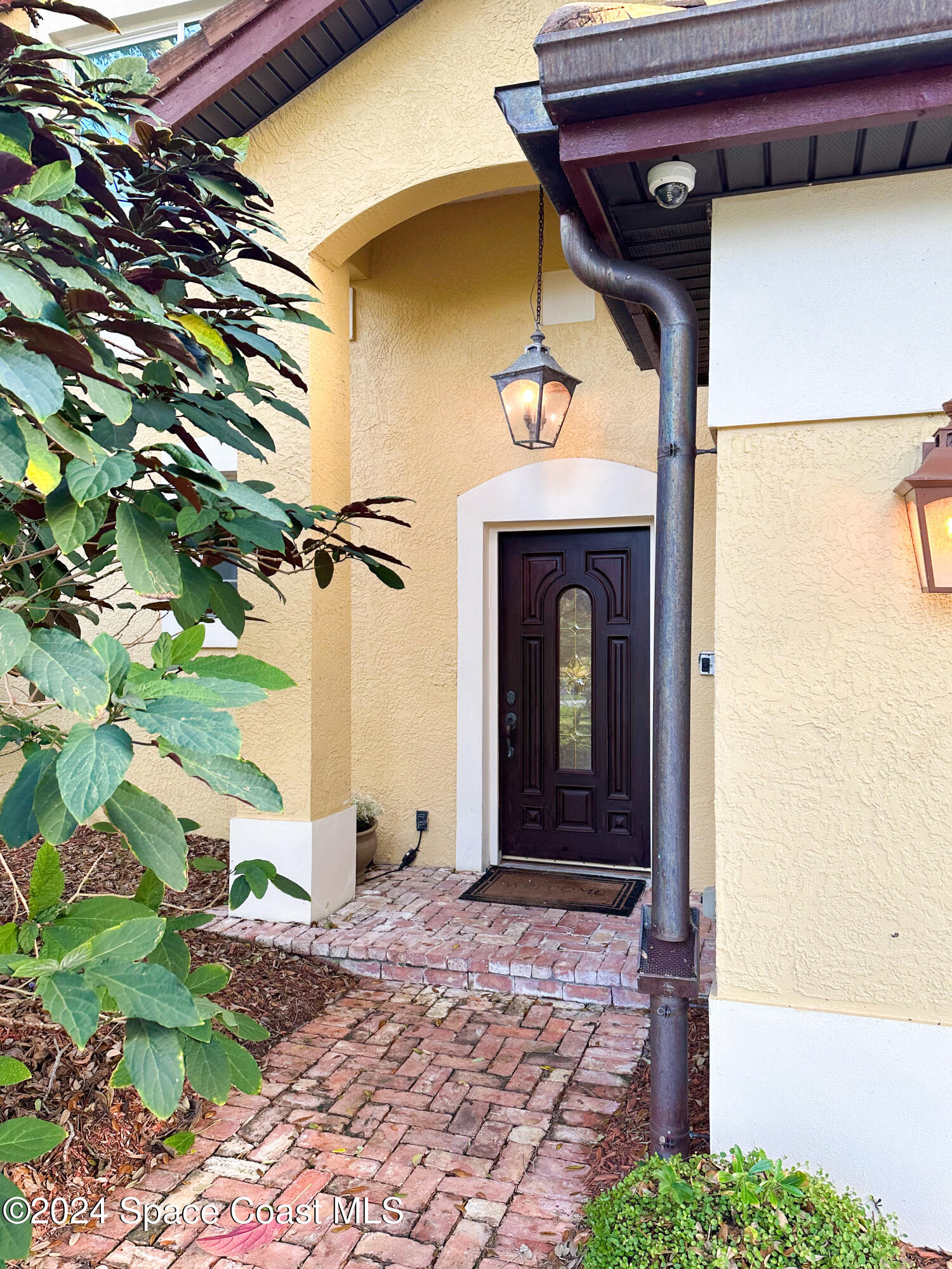 143 Caledonia Drive Melbourne Beach, FL 32951 - Photo 2 of 57 a view of a entryway door of the house